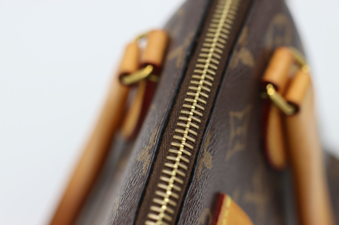 Louis Vuitton Rivoli Monogram Bag