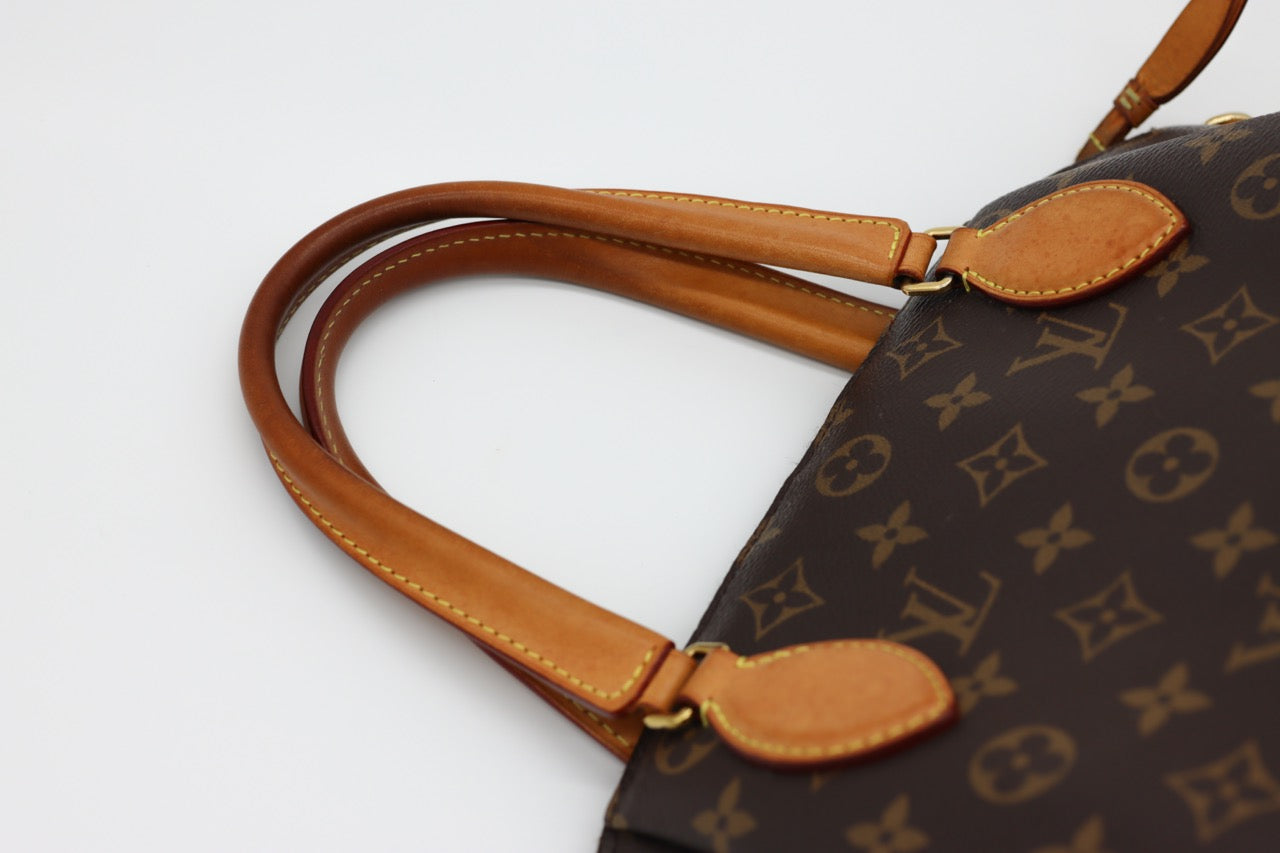 Louis Vuitton Rivoli Monogram Bag