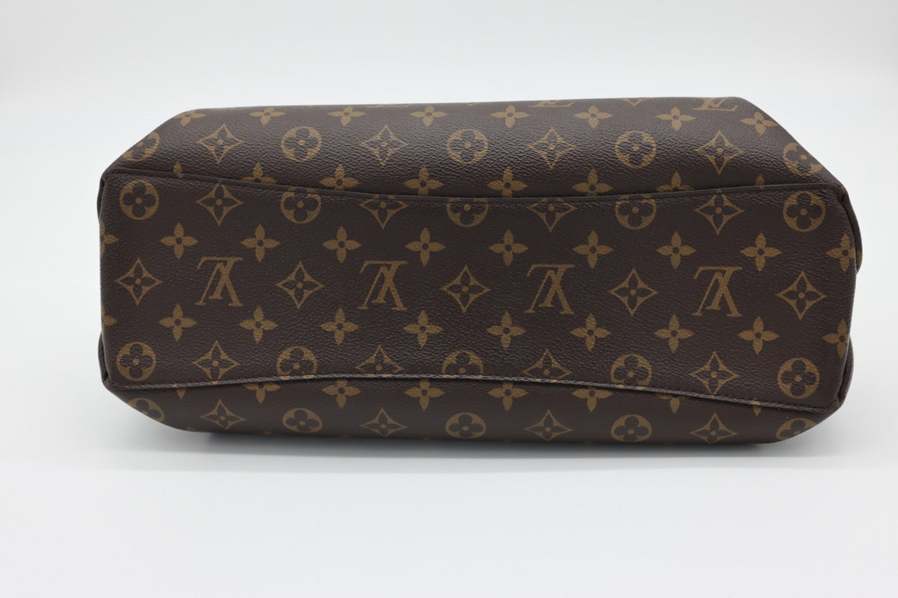 Louis Vuitton Rivoli Monogram Bag