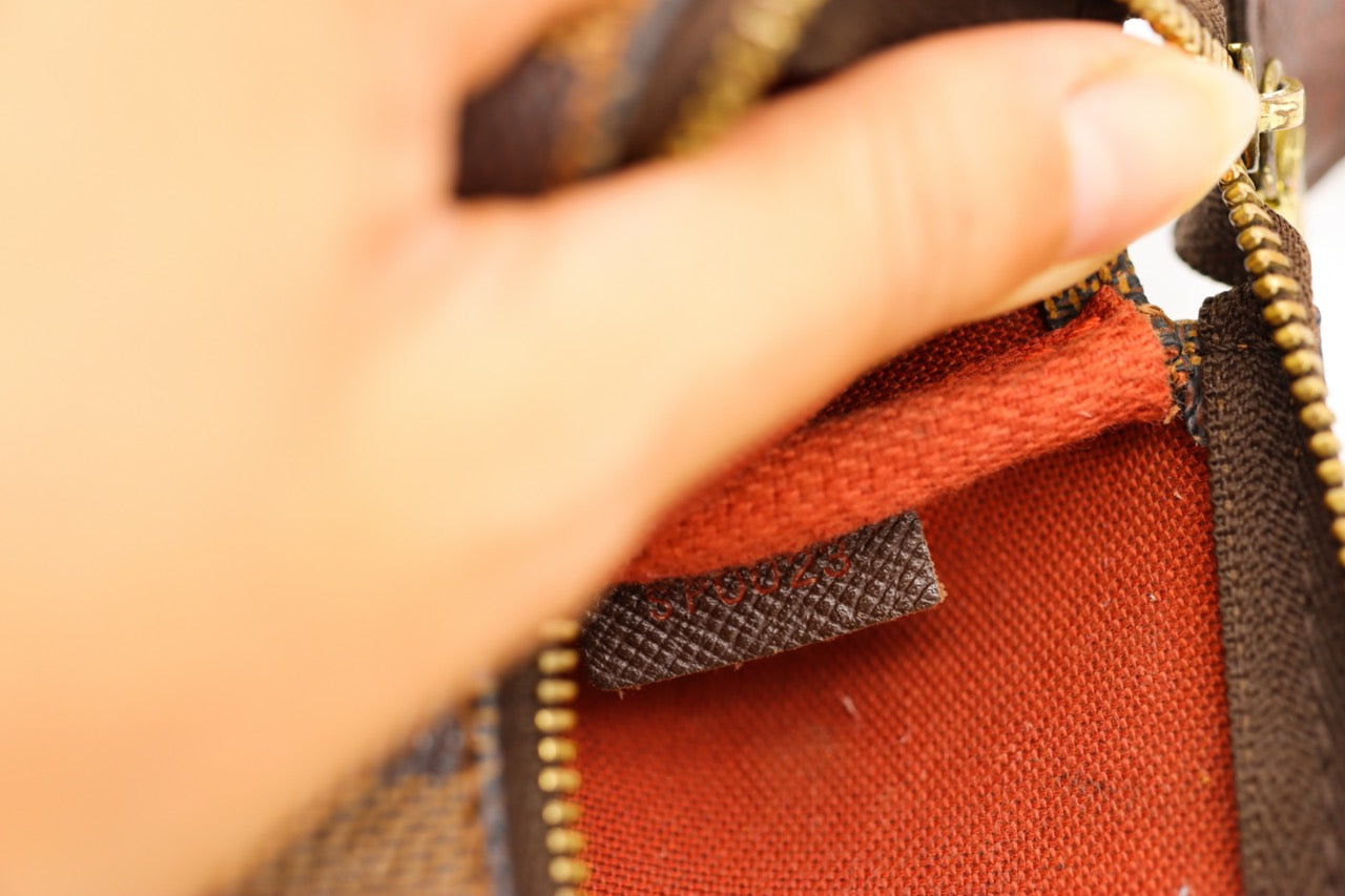 Louis Vuitton Mini Damier Ebene Pochette